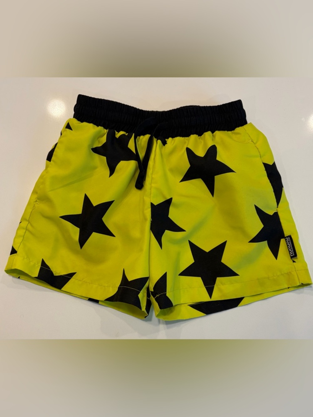 nununu Black Swim Shorts with Neon Yellow Lining and Star Detail